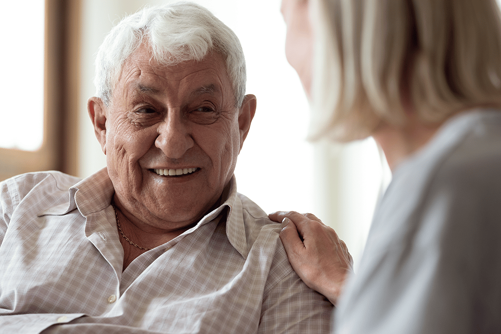 man smiling at nurse