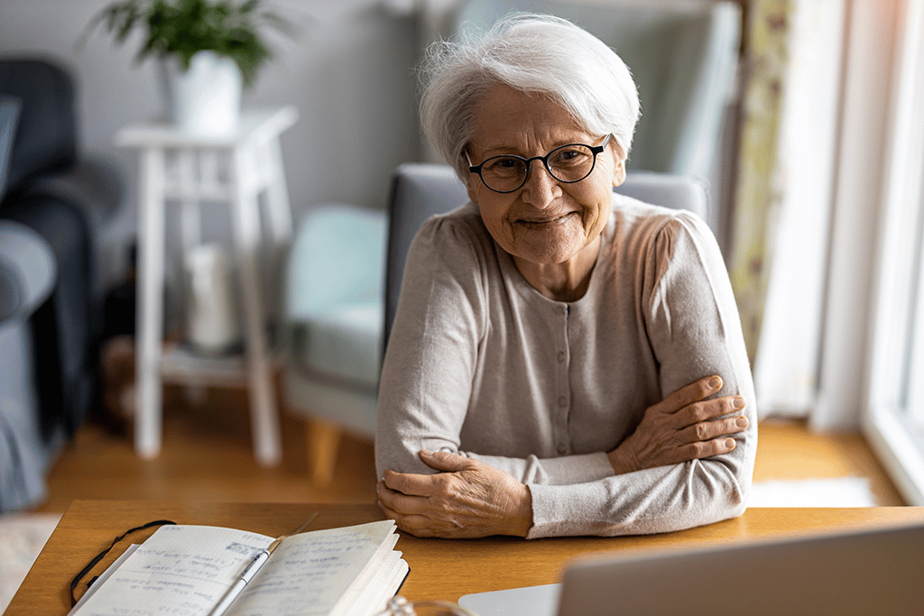 woman smiling in her apartment